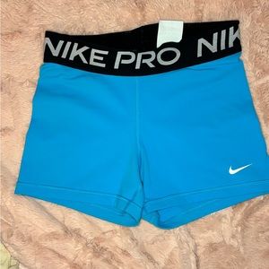 Light blue Nike pros